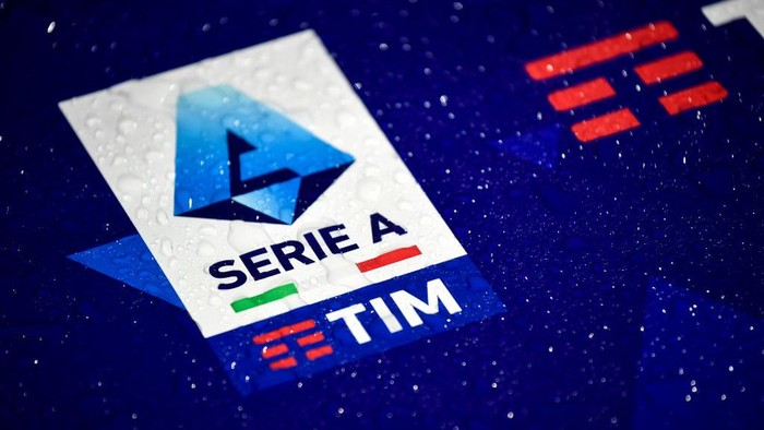 Serie A TIM logo on a blue surface with water droplets.